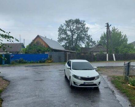 Білий Кіа Ріо, об'ємом двигуна 1.4 л та пробігом 266 тис. км за 6900 $, фото 7 на Automoto.ua