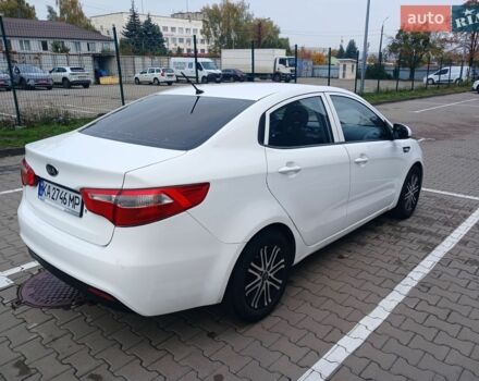Білий Кіа Ріо, об'ємом двигуна 1.4 л та пробігом 230 тис. км за 5300 $, фото 9 на Automoto.ua