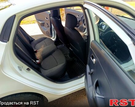 Білий Кіа Ріо, об'ємом двигуна 1.4 л та пробігом 99 тис. км за 6500 $, фото 8 на Automoto.ua