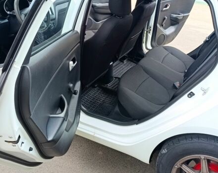 Белый Киа Рио, объемом двигателя 1.4 л и пробегом 99 тыс. км за 6517 $, фото 18 на Automoto.ua