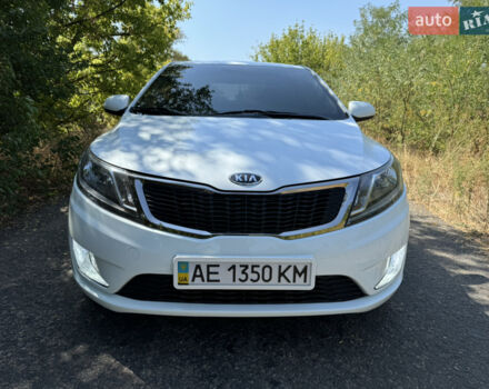 Білий Кіа Ріо, об'ємом двигуна 1.4 л та пробігом 96 тис. км за 8555 $, фото 7 на Automoto.ua