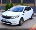 Білий Кіа Ріо, об'ємом двигуна 1.4 л та пробігом 99 тис. км за 6500 $, фото 1 на Automoto.ua