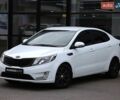 Білий Кіа Ріо, об'ємом двигуна 1.6 л та пробігом 127 тис. км за 8600 $, фото 1 на Automoto.ua