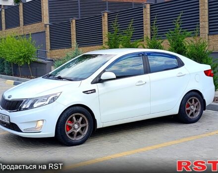Білий Кіа Ріо, об'ємом двигуна 1.4 л та пробігом 99 тис. км за 6500 $, фото 5 на Automoto.ua