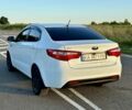Білий Кіа Ріо, об'ємом двигуна 1.4 л та пробігом 142 тис. км за 6200 $, фото 8 на Automoto.ua