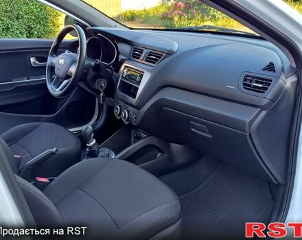 Білий Кіа Ріо, об'ємом двигуна 1.4 л та пробігом 52 тис. км за 8900 $, фото 9 на Automoto.ua