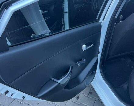 Білий Кіа Ріо, об'ємом двигуна 1.4 л та пробігом 171 тис. км за 6800 $, фото 20 на Automoto.ua
