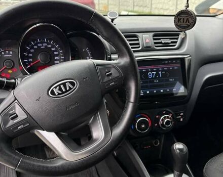 Білий Кіа Ріо, об'ємом двигуна 1.6 л та пробігом 91 тис. км за 8600 $, фото 19 на Automoto.ua