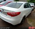 Білий Кіа Ріо, об'ємом двигуна 1.4 л та пробігом 289 тис. км за 3400 $, фото 7 на Automoto.ua