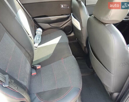 Білий Кіа Ріо, об'ємом двигуна 1.6 л та пробігом 206 тис. км за 6600 $, фото 8 на Automoto.ua