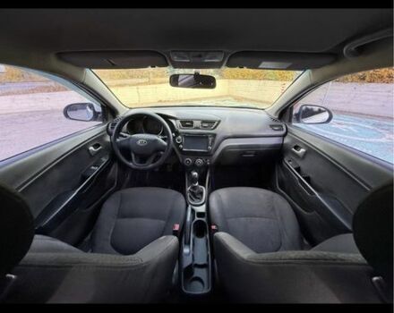 Белый Киа Рио, объемом двигателя 1.4 л и пробегом 210 тыс. км за 7500 $, фото 2 на Automoto.ua