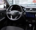 Білий Кіа Ріо, об'ємом двигуна 1.6 л та пробігом 127 тис. км за 8600 $, фото 10 на Automoto.ua