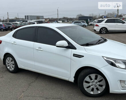 Белый Киа Рио, объемом двигателя 1.59 л и пробегом 290 тыс. км за 8000 $, фото 1 на Automoto.ua