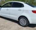 Білий Кіа Ріо, об'ємом двигуна 1.4 л та пробігом 235 тис. км за 7500 $, фото 2 на Automoto.ua