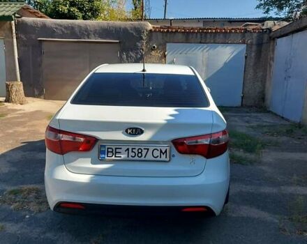 Білий Кіа Ріо, об'ємом двигуна 1.4 л та пробігом 69 тис. км за 8999 $, фото 1 на Automoto.ua