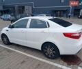 Білий Кіа Ріо, об'ємом двигуна 1.4 л та пробігом 230 тис. км за 5300 $, фото 1 на Automoto.ua