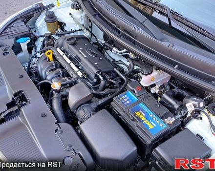 Білий Кіа Ріо, об'ємом двигуна 1.4 л та пробігом 52 тис. км за 8900 $, фото 8 на Automoto.ua