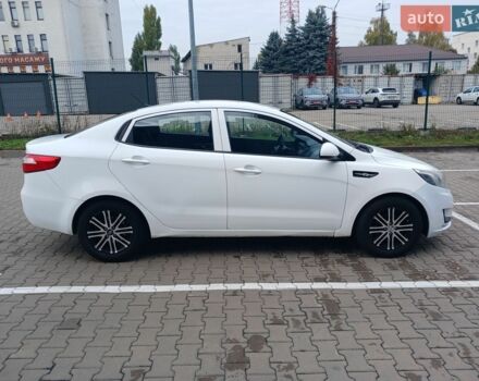 Білий Кіа Ріо, об'ємом двигуна 1.4 л та пробігом 230 тис. км за 5300 $, фото 7 на Automoto.ua
