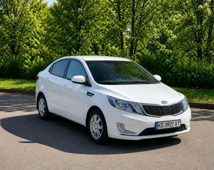 Белый Киа Рио, объемом двигателя 1.4 л и пробегом 210 тыс. км за 5700 $, фото 1 на Automoto.ua