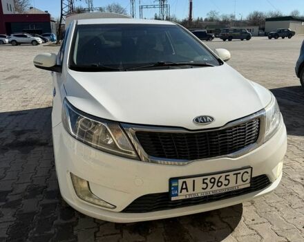 Білий Кіа Ріо, об'ємом двигуна 1.6 л та пробігом 235 тис. км за 7600 $, фото 2 на Automoto.ua