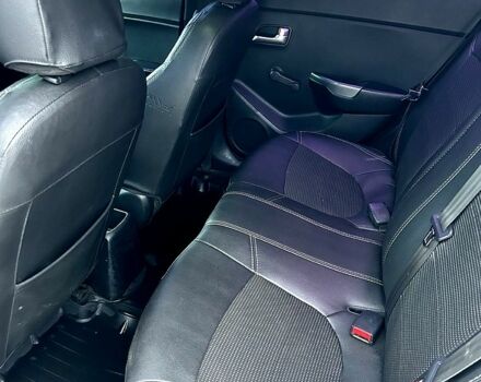 Білий Кіа Ріо, об'ємом двигуна 1.4 л та пробігом 31500 тис. км за 5300 $, фото 6 на Automoto.ua