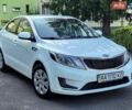 Белый Киа Рио, объемом двигателя 1.4 л и пробегом 142 тыс. км за 9300 $, фото 1 на Automoto.ua