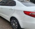 Білий Кіа Ріо, об'ємом двигуна 1.4 л та пробігом 220 тис. км за 6100 $, фото 5 на Automoto.ua