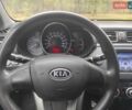 Белый Киа Рио, объемом двигателя 1.4 л и пробегом 253 тыс. км за 7050 $, фото 5 на Automoto.ua