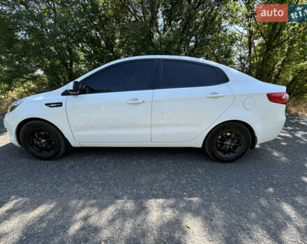 Білий Кіа Ріо, об'ємом двигуна 1.4 л та пробігом 96 тис. км за 8555 $, фото 12 на Automoto.ua