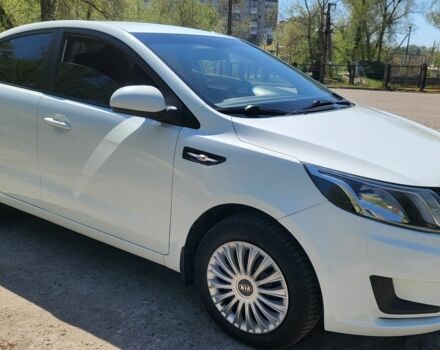 Білий Кіа Ріо, об'ємом двигуна 1.4 л та пробігом 235 тис. км за 7500 $, фото 1 на Automoto.ua