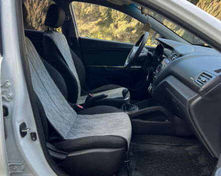 Белый Киа Рио, объемом двигателя 1.4 л и пробегом 143 тыс. км за 6500 $, фото 34 на Automoto.ua