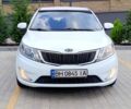 Белый Киа Рио, объемом двигателя 1.4 л и пробегом 99 тыс. км за 6517 $, фото 1 на Automoto.ua