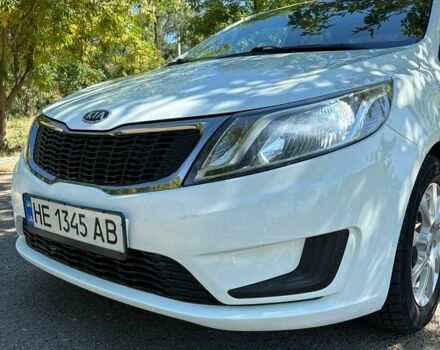 Белый Киа Рио, объемом двигателя 1.4 л и пробегом 131 тыс. км за 8499 $, фото 1 на Automoto.ua