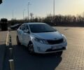 Білий Кіа Ріо, об'ємом двигуна 1.6 л та пробігом 235 тис. км за 7600 $, фото 1 на Automoto.ua