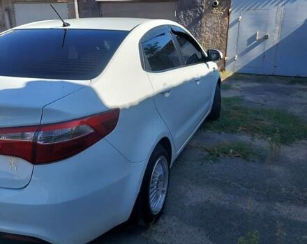 Білий Кіа Ріо, об'ємом двигуна 1.4 л та пробігом 69 тис. км за 8999 $, фото 2 на Automoto.ua