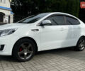 Белый Киа Рио, объемом двигателя 1.4 л и пробегом 295 тыс. км за 6299 $, фото 2 на Automoto.ua
