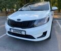 Білий Кіа Ріо, об'ємом двигуна 1.4 л та пробігом 149 тис. км за 9500 $, фото 1 на Automoto.ua