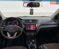 Білий Кіа Ріо, об'ємом двигуна 1.4 л та пробігом 96 тис. км за 8555 $, фото 14 на Automoto.ua