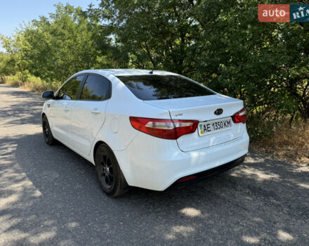 Білий Кіа Ріо, об'ємом двигуна 1.4 л та пробігом 96 тис. км за 8555 $, фото 4 на Automoto.ua