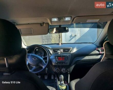 Білий Кіа Ріо, об'ємом двигуна 1.4 л та пробігом 69 тис. км за 8999 $, фото 14 на Automoto.ua