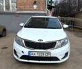 Белый Киа Рио, объемом двигателя 1.4 л и пробегом 256 тыс. км за 5200 $, фото 1 на Automoto.ua