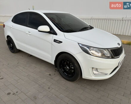Білий Кіа Ріо, об'ємом двигуна 1.4 л та пробігом 96 тис. км за 8555 $, фото 15 на Automoto.ua