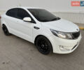 Білий Кіа Ріо, об'ємом двигуна 1.4 л та пробігом 96 тис. км за 8555 $, фото 15 на Automoto.ua