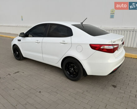 Білий Кіа Ріо, об'ємом двигуна 1.4 л та пробігом 96 тис. км за 8555 $, фото 18 на Automoto.ua
