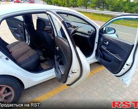 Білий Кіа Ріо, об'ємом двигуна 1.4 л та пробігом 99 тис. км за 6500 $, фото 10 на Automoto.ua