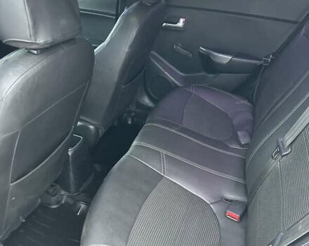 Белый Киа Рио, объемом двигателя 1.4 л и пробегом 315 тыс. км за 4999 $, фото 9 на Automoto.ua