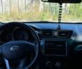 Белый Киа Рио, объемом двигателя 1.4 л и пробегом 129 тыс. км за 7500 $, фото 10 на Automoto.ua