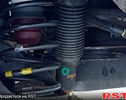 Білий Кіа Ріо, об'ємом двигуна 1.4 л та пробігом 52 тис. км за 8900 $, фото 11 на Automoto.ua