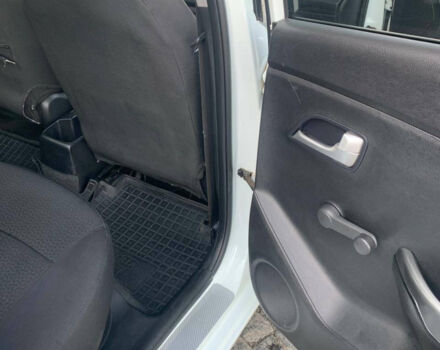 Білий Кіа Ріо, об'ємом двигуна 1.4 л та пробігом 175 тис. км за 6600 $, фото 2 на Automoto.ua