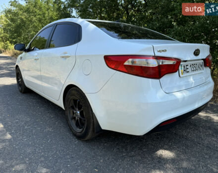 Білий Кіа Ріо, об'ємом двигуна 1.4 л та пробігом 96 тис. км за 8555 $, фото 9 на Automoto.ua